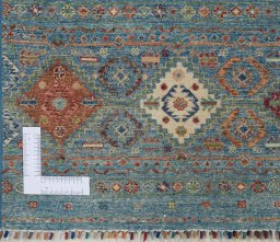 Corner detail of New Samarkand rug showing border pattern and Wool pile