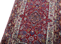 Backside of handmade 2000s Jozan rug showing knot structure and weave density