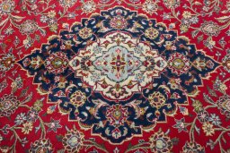 Central medallion detail of 2000s Kashan rug from Iran / Persia
