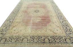 Surface texture of 1950s Vintage rug with natural Wool and intricate pattern
