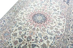 Backside of handmade 2000s Nain rug showing knot structure and weave density