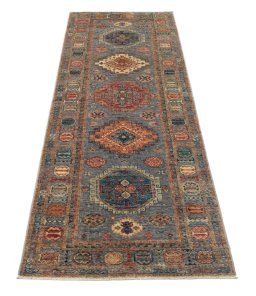 Surface texture of New Kazak rug with natural Wool and intricate pattern