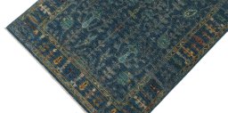 Backside of handmade New Farahan rug showing knot structure and weave density