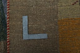 Close-up detail of 2000s Persian Gabbeh rug from Pakistan showing Wool weave