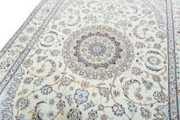 Backside of handmade 2000s Nain rug showing knot structure and weave density