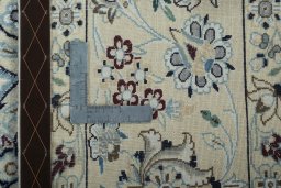 Backside of handmade 2000s Nain rug showing knot structure and weave density
