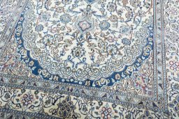 Close-up detail of 2000s Nain rug from Iran / Persia showing Wool weave