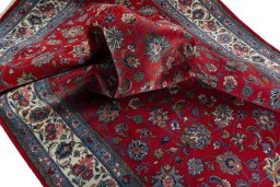 Surface texture of 2000s Sarough rug with natural Wool and intricate pattern
