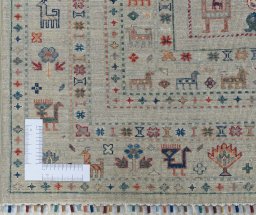 Corner detail of New Samarkand rug showing border pattern and Wool pile