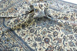 Surface texture of 2000s Nain rug with natural Wool and intricate pattern