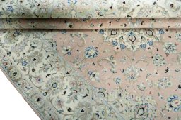Close-up detail of New Kashan rug from Iran / Persia showing Wool weave