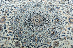 Central medallion detail of 2000s Kashmar rug from Iran / Persia