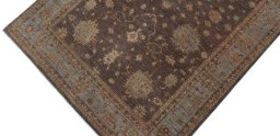 Backside of handmade New Farahan rug showing knot structure and weave density