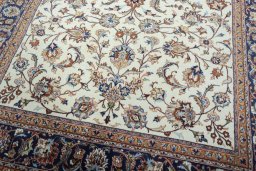 Close-up detail of 2000s Mashad rug from Iran / Persia showing Wool weave