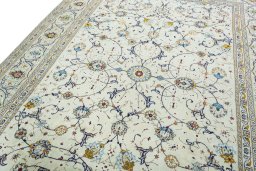 Backside of handmade 2000s Kashan rug showing knot structure and weave density