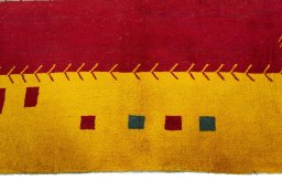 Central medallion detail of 2000s Persian Gabbeh rug from Pakistan
