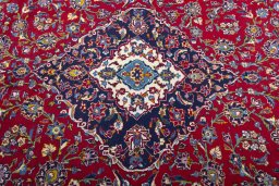Central medallion detail of 2000s Kashan rug from Iran / Persia