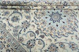 Close-up detail of 2000s Nain rug from Iran / Persia showing Wool weave