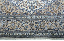 Full view of 2000s Kashan rug from Iran / Persia, 407 × 293 cm in Beige tones