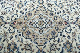 Central medallion detail of 2000s Kashan rug from Iran / Persia