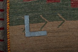 Close-up detail of 2000s Persian Gabbeh rug from Pakistan showing Wool weave