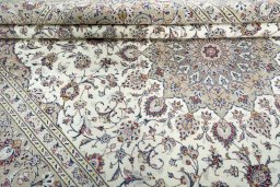 Close-up detail of 2000s Kashan rug from Iran / Persia showing Wool weave