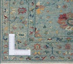 Corner detail of New Farahan rug showing border pattern and Wool pile