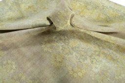 Surface texture of 1970s Vintage rug with natural Wool and intricate pattern