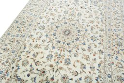 Backside of handmade New Kashan rug showing knot structure and weave density