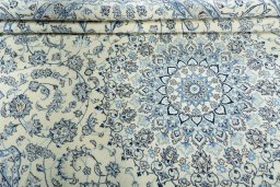 Close-up detail of New Nain rug from Iran / Persia showing Wool weave