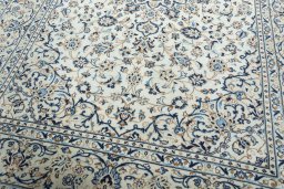 Close-up detail of 2000s Kashan rug from Iran / Persia showing Wool weave