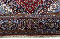 Full view of 2000s Kashan rug from Iran / Persia, 216 × 137 cm in Red tones