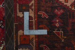 Surface texture of 2000s Shiraz rug with natural Wool and intricate pattern
