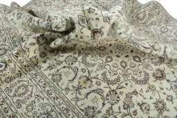 Surface texture of 2000s Kashan rug with natural Wool and intricate pattern