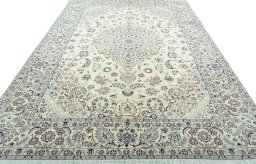 Surface texture of 2000s Nain rug with natural Wool and intricate pattern