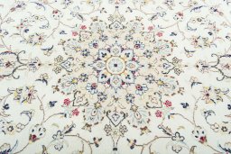 Central medallion detail of 2000s Kashan rug from Iran / Persia