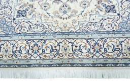 Full view of 2000s Nain rug from Iran / Persia, 302 × 205 cm in Beige tones
