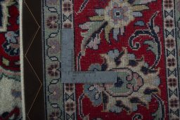 Backside of handmade 2000s Sarough rug showing knot structure and weave density