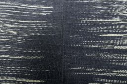 Backside of handmade New Kilim Kiasar rug showing knot structure and weave density
