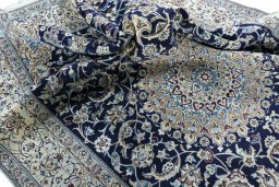 Surface texture of New Nain rug with natural Wool and intricate pattern