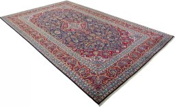 Close-up detail of 2000s Kashan rug from Iran / Persia showing Wool weave