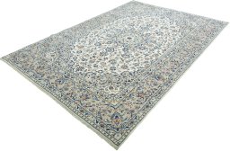 Corner detail of 2000s Kashan rug showing border pattern and Wool pile