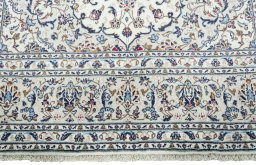 Full view of 2000s Kashan rug from Iran / Persia, 301 × 201 cm in Beige tones