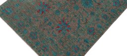 Backside of handmade New Farahan rug showing knot structure and weave density