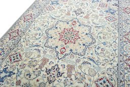 Backside of handmade 2000s Nain rug showing knot structure and weave density