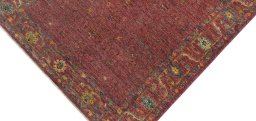 Backside of handmade New Farahan rug showing knot structure and weave density