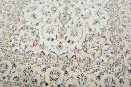 Close-up detail of 2000s Kashan rug from Iran / Persia showing Wool weave