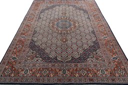 Surface texture of 2000s Moud rug with natural Wool and intricate pattern