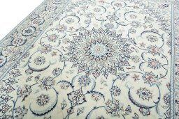 Backside of handmade 2000s Nain rug showing knot structure and weave density