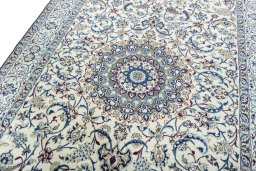 Backside of handmade 2000s Nain rug showing knot structure and weave density